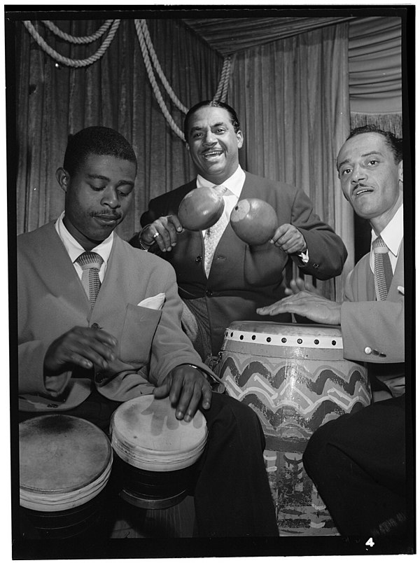 Jose Mangual, Sr. on bongos (left) alongside Machito on maracas and Carlos Vidal on conga at the Glen Island Casino, New York, 1947