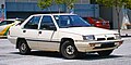 1990–1992 Proton Saga 1.5L saloon in Cyberjaya, Malaysia (01, Exterior).jpg