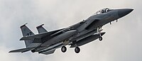 A US Air Force F-15C Eagle, tail number 80-0012, on final approach at Kadena Air Base in Okinawa, Japan