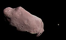 Imagem Galileo de 243 Ida (o ponto à direita é a sua lua Dactyl)