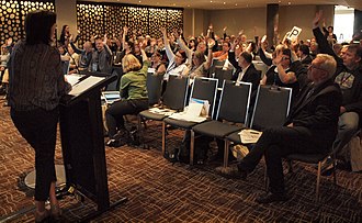 Members vote, at the society's 2016 Annual General Meeting Australian Society of Archivists taking a vote, Annual General Meeting, 19 October 2016 (30746346751).jpg