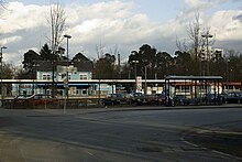 West side bus stop and Park+Ride parking area Bahnhof Neu-Isenburg Westseite.jpg