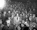 Bob Hope sits with men of US X Corps, as members of his troupe entertain at Womsan, Korea. October 26, 1950. (US Army)