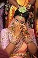 File:Bride adjusting her nose piercing.jpg