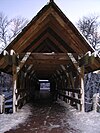 A covered bridge along the Riverwalk.