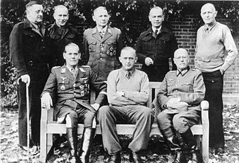 Another photo of German officers at Trent Park.
Back row from left to right: General der Infanterie Dietrich von Choltitz, Oberst Gerhard Wilck, General der Fallschirmtruppe Hermann-Bernhard Ramcke, Generalmajor Knut Eberding, Oberst Eberhard Wildermuth
Front row from left to right: Generalleutnant Rudiger von Heyking, Generalleutnant Karl-Wilhelm von Schlieben, Generalleutnant Wilhelm Daser Bundesarchiv Bild 146-2005-0136, Trent Park Camp, deutsche Offiziere.jpg