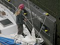 Chittenden Locks - sailboat tying off.jpg