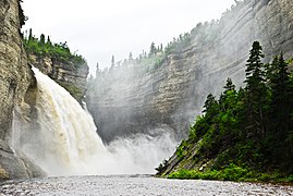 Cliff wall, fall and Vauréal River