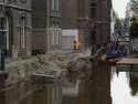 Close-up of the old canal quay of Grimburgwal, collapsed in Fall of 2020. A big warning for Amsterdam, the historical canal city of North Europe. Free photo of old town of Amsterdam by Fons Heijnsbroek, 2020