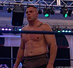 Dasher Hatfield defeated and unmasked 03.jpg