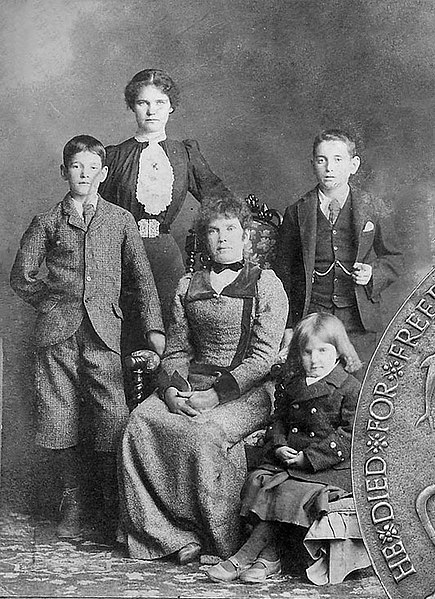Mannock (far left) with family members