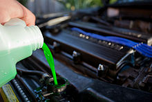 Coolant being poured into the radiator of an automobile Engine coolant.jpg