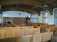 The English Classroom, the largest of the 31 Nationality Rooms, contains several artifacts from the original second House of Commons English Room - Pitt - IMG 0501.jpg