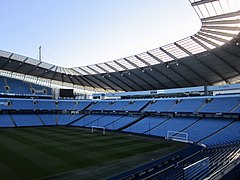 City of Manchester Stadium, 2002 completion and 2015 expansion (by Arup Group for completed architecture, and Populous for expanded architecture)