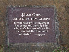 A text from Revelation 14:7 on a metal plaque set in a stone boulder near the parking area and viewpoint on Hawksworth Road north of Baildon (photographed in 2006). Fear God... - geograph.org.uk - 247682.jpg