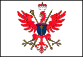 Aigle rouge royal, portant la couronne brandebourgeoise, sur croisée d'un sceptre et d'une épée et avec en son centre un blason bleu reprenant le symbole du sceptre.