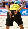 Image 27Brazil's Emanuel Rego signals for an "angle" block for the opposing player on the left and a "line" block for the opposing player on the right (from Beach volleyball)