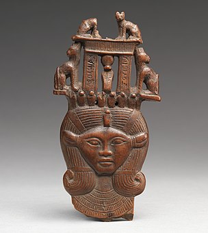 Head of Hathor from a clapper; 1295–664 BC; possibly boxwood; 12 × 6.2 cm; Metropolitan Museum of Art