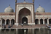 Jami' Masjid, also known as a Jama Masjid situated in Delhi, India. This is the largest mosque in India and was begun by Shah Jahan in 1650 and completed after six years at a cost of about ten lakhs of rupees.