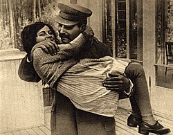 Svetlana Alliluyeva, the daughter of Joseph Stalin, pictured with her father in 1935. Alliluyeva defected in 1967 via New Delhi to the United States and denounced Stalin's regime and the Soviet government. In 1984 she returned to the USSR, where she applied for and was granted Soviet citizenship. Joseph Stalin with daughter Svetlana, 1935.jpg