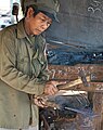 Laos .- Forgeron du village de Houayhe (1)