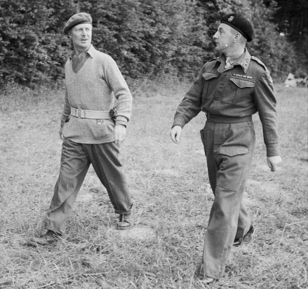 Lieutenant General Gerard Bucknall (left) with Brigadier Harold Pyman in Normandy, 1944.