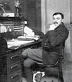 Lucien Petit-Breton en la oficina de su negocio en Périgueux (1909)