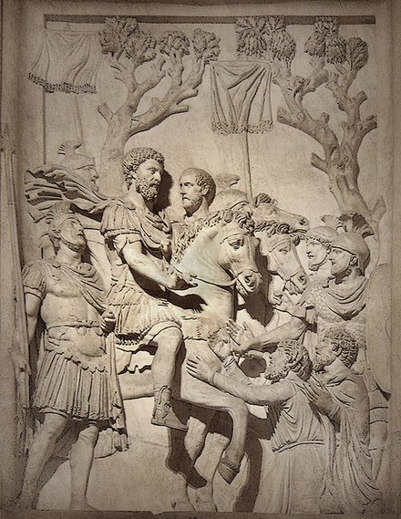 Emperor Marcus Aurelius shows clemency to the vanquished after his success against tribes (Capitoline Museum in Rome)