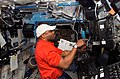 Melvin working on robotic computers in US lab.jpg