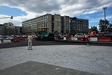 Moscow, Pushkinskaya Street, pavers at work (31154204060).jpg