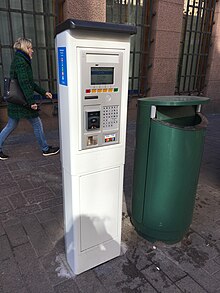 Multispace parking meter and trash can (40872675870).jpg