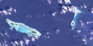 NASA satellite image with the two islands of the Zohhoiiyoru Bank on the right.  On the left are the Turtle Islands.