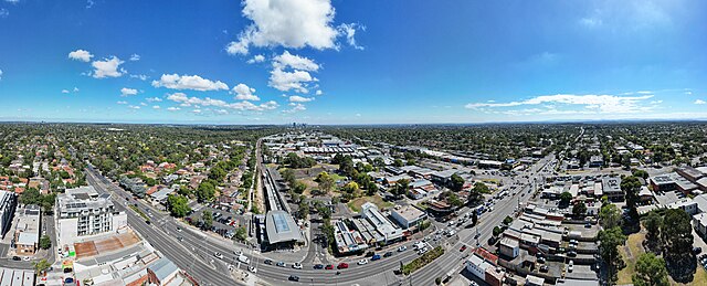 Nunawading aerial panorama facing Melbourne skyline. March 2024.