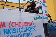 An Oxfam cholera awareness-raising campaign in Mbandaka, Democratic Republic of Congo Oxfam East Africa - An Oxfam cholera prevention float.jpg