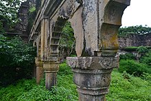 Pillars of ruined building at Vijaygarh Fort