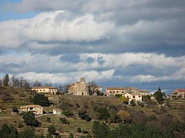 The church and surrounding buildings in Planzolles