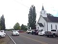 Parishoners and public arriving at church for dedication ceremony