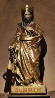 Statue de Saint Joseph couronné tenant une ancre, symbole d'espérance.