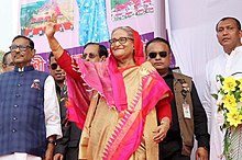 Director General of SSF Major General Mujibur Rahman accompanying Prime Minister Sheikh Hasina on her visit to Kotalipara alongside Minister of Road Transport and Bridges Obaidul Quader Sheikh Hasina 2023.jpg