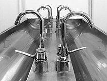 Stainless steel taps and sink Sink and taps in the men's locker room 3 BW.jpg