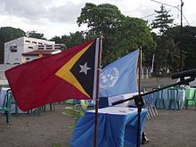 The flags of East Timor and the United Nations on Independence Day 2014. Sitz des Administrators in Oecusse.jpg
