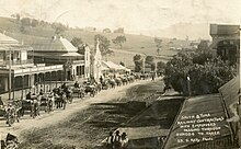 Smith & Tims railway contractors with employees passing through Dungog to Taree, 1909. Smith & Tims railway contractors with employees passing through Dungog to Taree.jpg