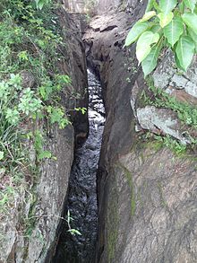 This rock cut deep canal acts as the sluice for the tank. Currently the tank and this ancient structure have been declared as archaeological protected monuments.