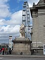 View of the South Bank Lion from the south - with corner of County Hall, and the London Eye behind