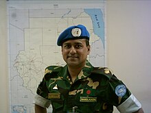 Bangladesh officer (Major Tasawar) wearing UN blue beret Tasawwar - UNMIS.JPG