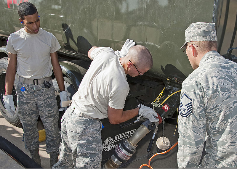 File:U.S. Air Force Airman Kyle Coates and Airman Brandon Vasquez, both with the 364th Training Squadron (TRS), practices filling an R-11 jet fuel truck while Master Sgt. Edward Braddy, right, an instructor with the 110712-F-NS900-002.jpg