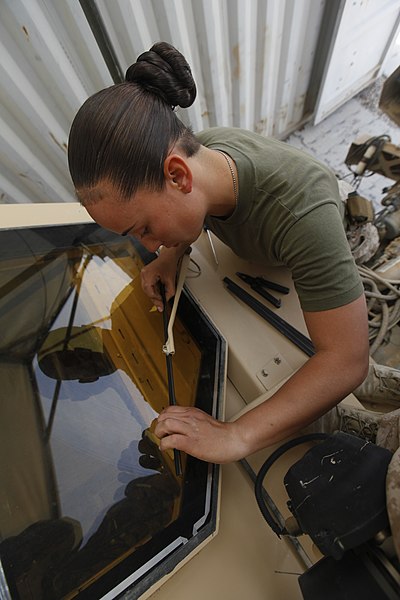 File:U.S. Marine Corps Cpl. Daisy A. Marrero Cardoza, a vehicle recovery operator with Marine Wing Support Squadron 271, replaces windshield wipers on a mine-resistant, ambush-protected all-terrain vehicle at Camp 130401-M-BU728-118.jpg