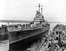 Columbia in dry dock in January 1944 USS Columbia (CL-56) docks in ABSD-1 at Espiritu Santo, in January 1944.jpg