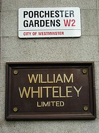 A street sign and a plaque for Whiteleys. Whiteley's, Bayswater - geograph.org.uk - 974808.jpg