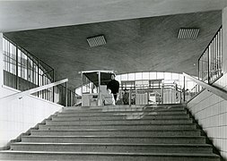 Women with pram in Blackeberg tube station in Stockholm.jpg